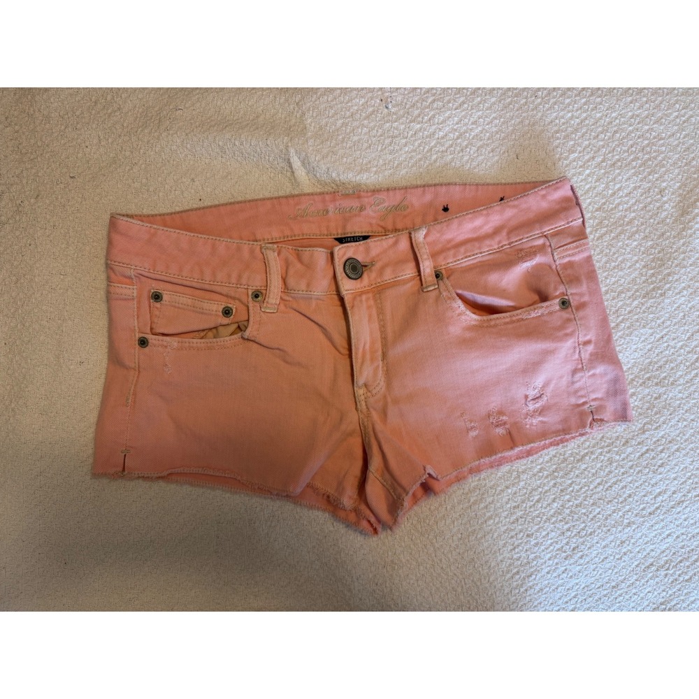 American Eagle Peach Coral Distressed Denim Shorts Low Rise Raw Hem Size 10
